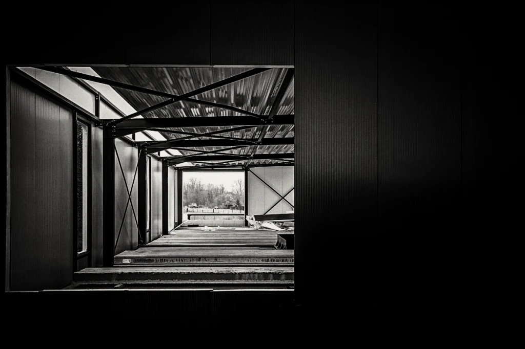 Light and repeating shadows inside an industrial building